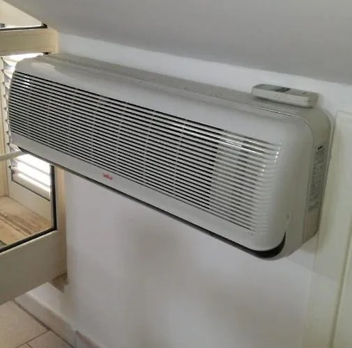 לינה וארוחת בוקר Rosy House